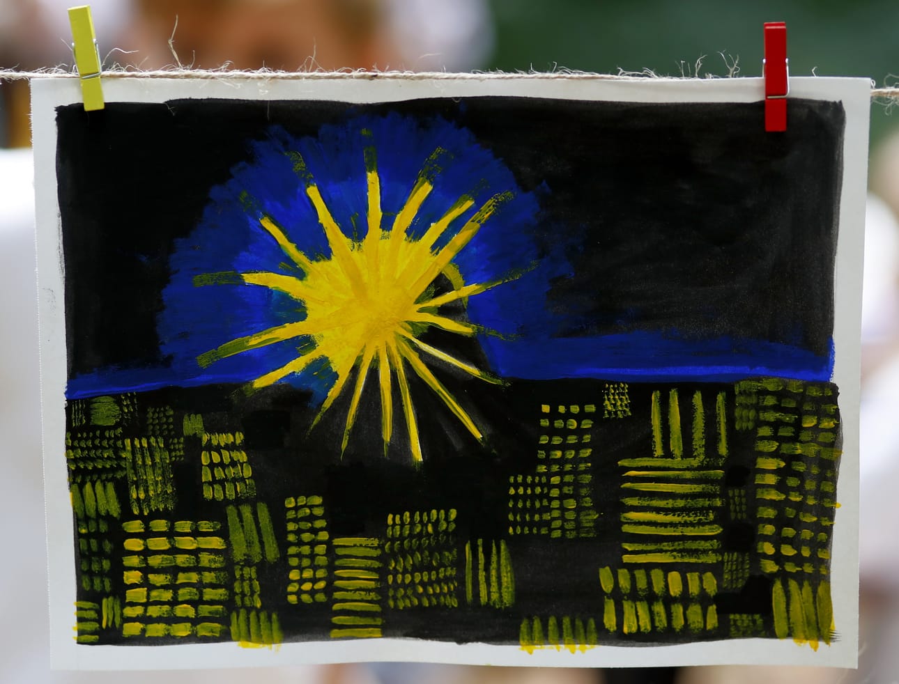 Ukrainalaisen pakolaislapsen tekemä maalaus oli esillä Ukrainan itsenäisyyspäivän juhlassa Romanian Bukarestissa. Arkistokuva.