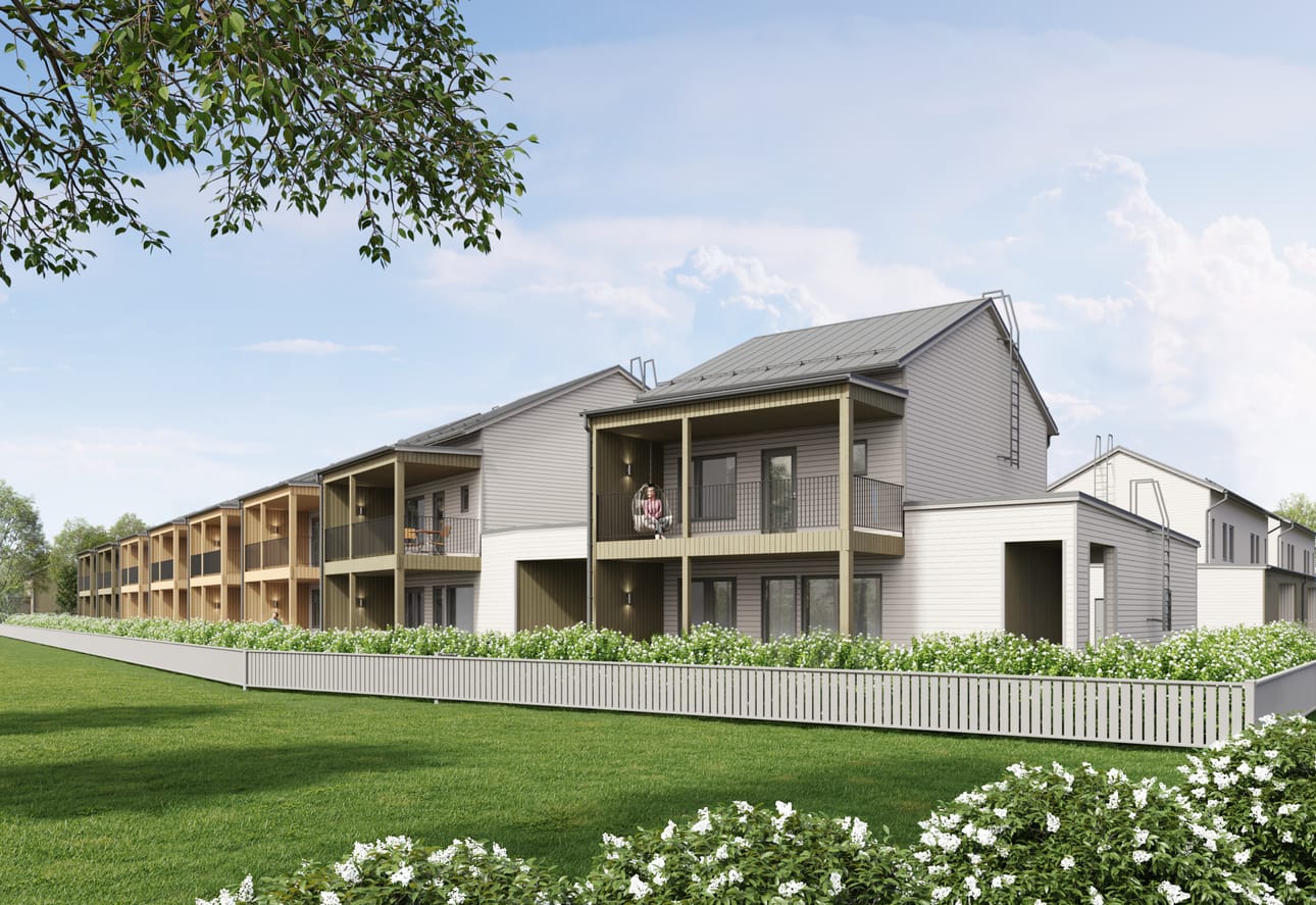 Vaakalautapaneelein verhottujen talojen väritys on hillityn ja maanläheisen vaalea.