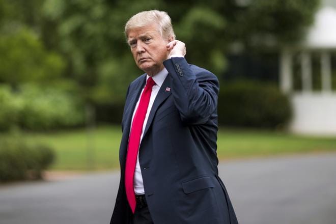 Trump oikoi asianajajansa sanomisia perjantaina. KUVA: