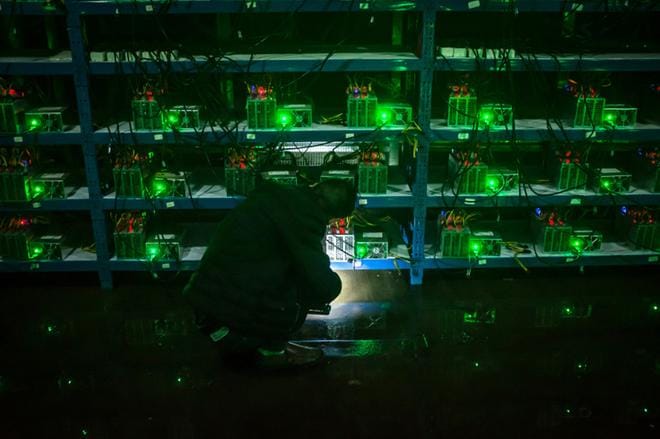 Virtuaalivaluuttoja louhitaan tietokoneilla. KUVA: LIU XINGZHE/CHINAFILE