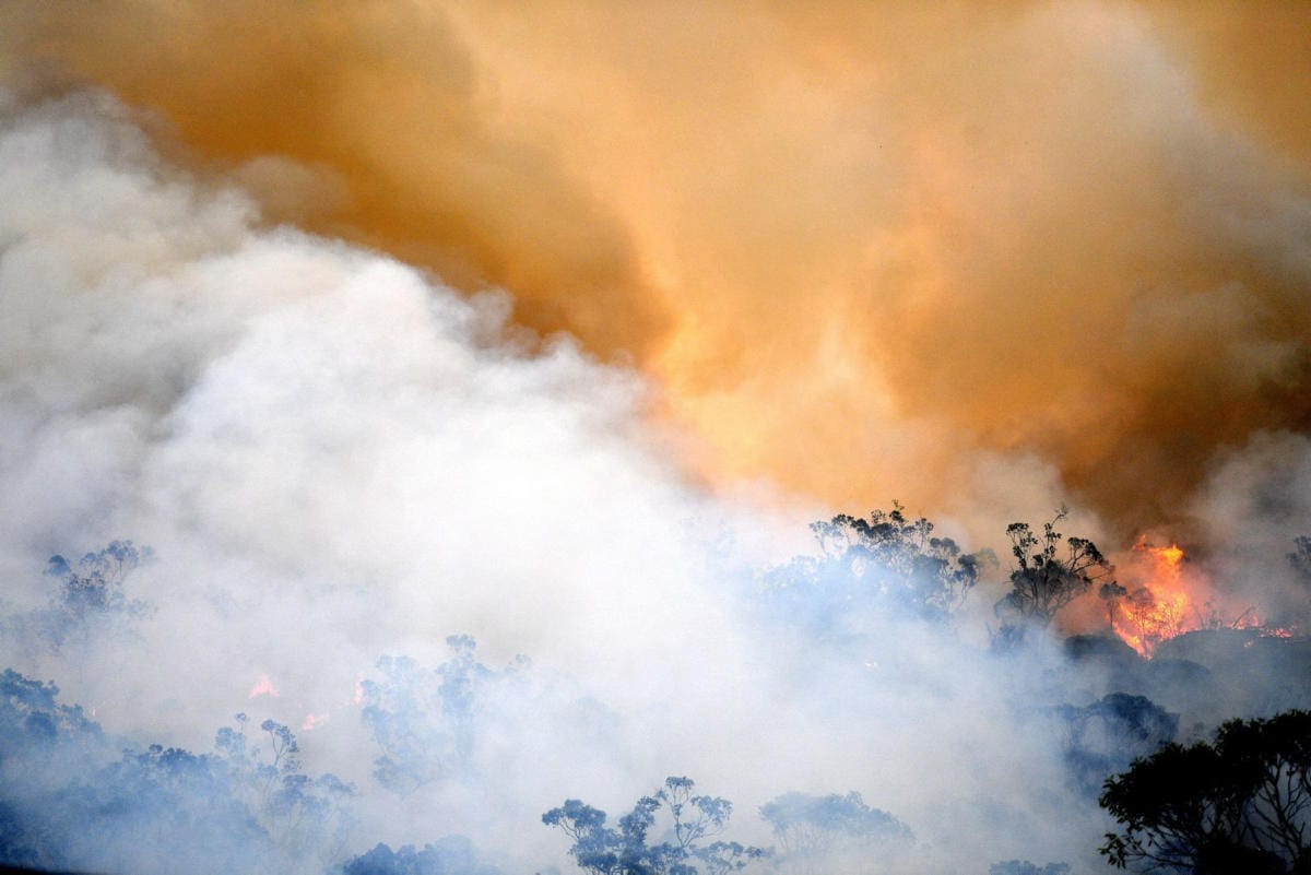 Helteestä ja kuivuudesta johtuvat maastopalot ovat toistuva ilmiö Australiassa. Kuva vuodelta 2019. LEHTIKUVA / AFP