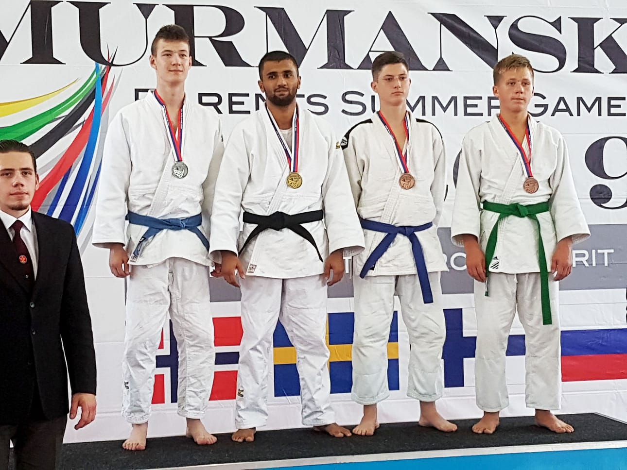 Sarjan 66 kiloa mitalistit: Ilmari Pekki (vas.) hopeaa, Fariz Taksirzade kultaa, Artemi Filimonov pronssia ja Vladislav Galkin pronssia.