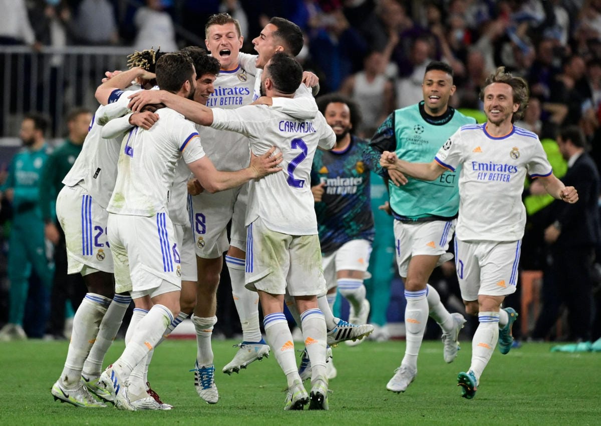 Real Madridin pelaajia juhlimassa ottelun päätteeksi. LEHTIKUVA / AFP