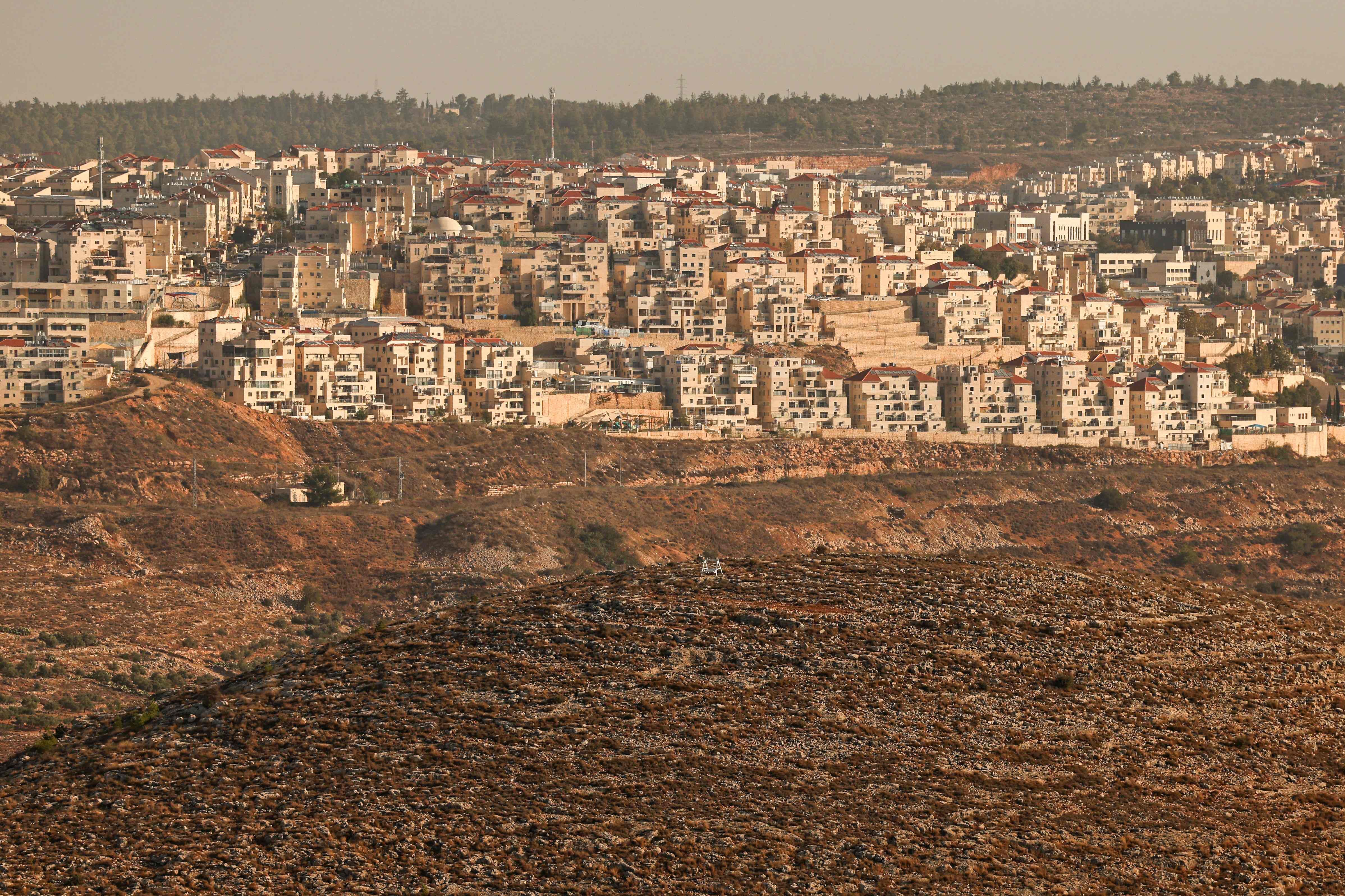 YK: Israelin laittomia siirtokuntia laajennetaan Länsirannalla ennätystahtiin