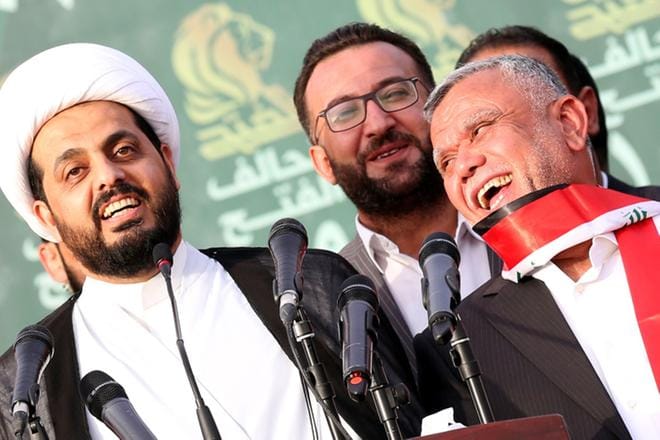 Iranin tukema Hadi al-Amiri (oik.) on vahva ehdokas Irakin pääministeriksi. Toisen shiiajärjestön johtaja Qais al-Khazali kuuluu samaan vaaliliittoon Amirin kanssa. KUVA: