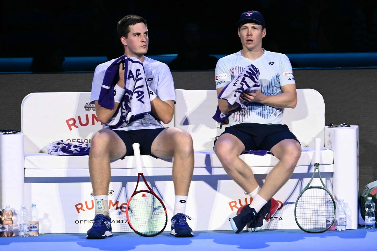 Henry Patten (vas.) ja Harri Heliövaara (oik.) hävisivät kauden avausottelunsa Australian Brisbanessa. LEHTIKUVA/AFP