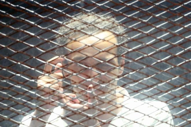 Yksi syytetyistä on valokuvaaja Mahmoud Abu Zeid, joka pidätettiin, kun hän oli kuvaamassa mielenosoituksia. KUVA: KHALED ELFIQI