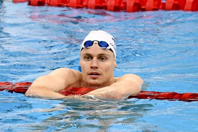 Ari-Pekka Liukkonen harjoitteli Tokiossa torstaina, perjantaina hän oli Suomen toisena lipunkantajana avajaisissa. Kuva: Heikki Saukkomaa / Lehtikuva