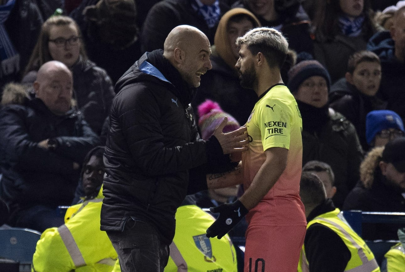 Manchester Cityn valmentaja Pep Guardiola ja hyökkääjä Sergio Aguero. Arkistokuva.