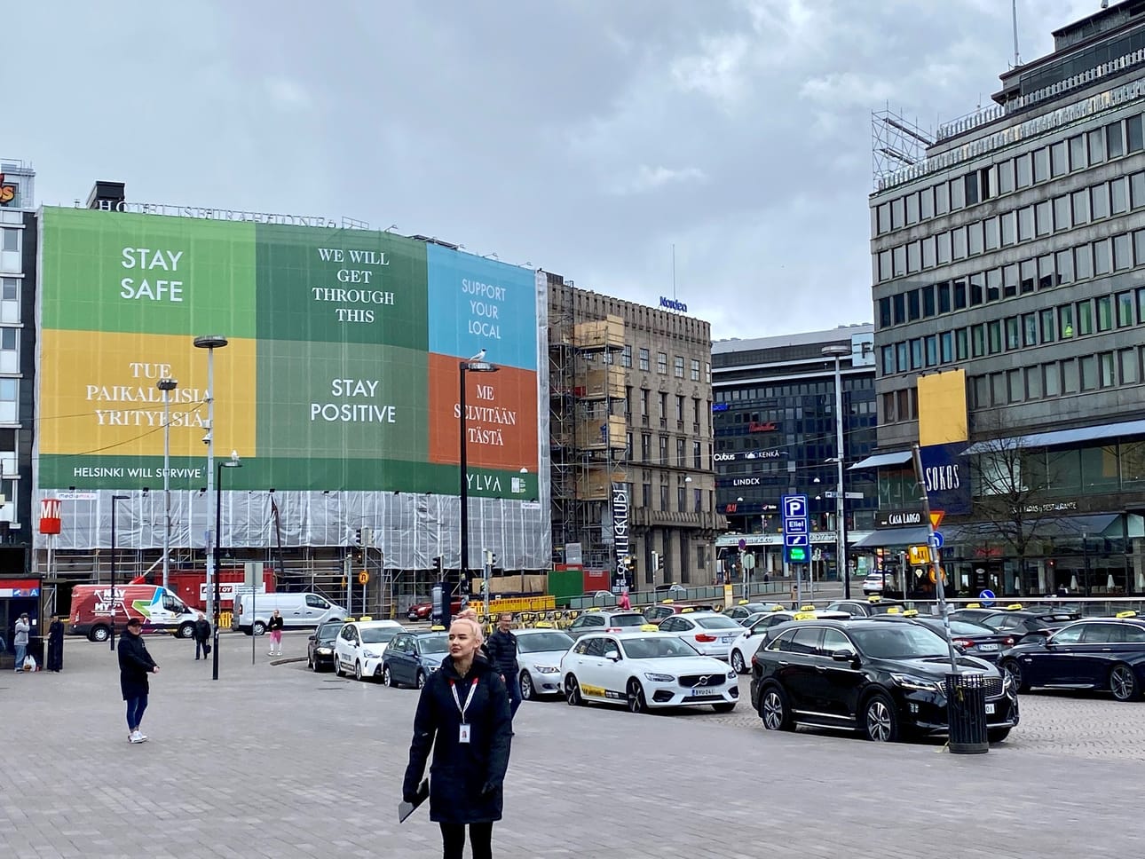 The railway square in central Helsinki has slowly returned to life. A lonely activist seeks to gather signatures, while a line of taxes waits for customers on Tuesday, May 12th.