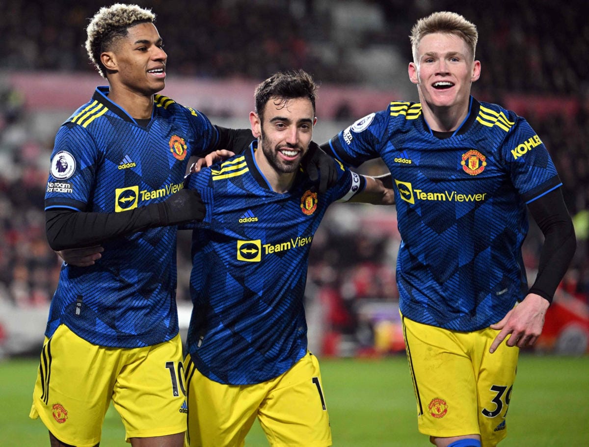 Manchester Unitedin pelaajat juhlistivat Marcus Rashfordin (vas.) maalia. LEHTIKUVA / AFP