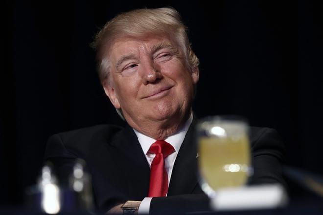 Kansanedustaja Antero Laukkasen mukaan Yhdysvaltain presidentin Donald Trumpin rukousaamiaisella torstaina välittyi tiivis ja innostunut tunnelma. Trumpiakin hymyilytti. KUVA: Win McNamee/EPA