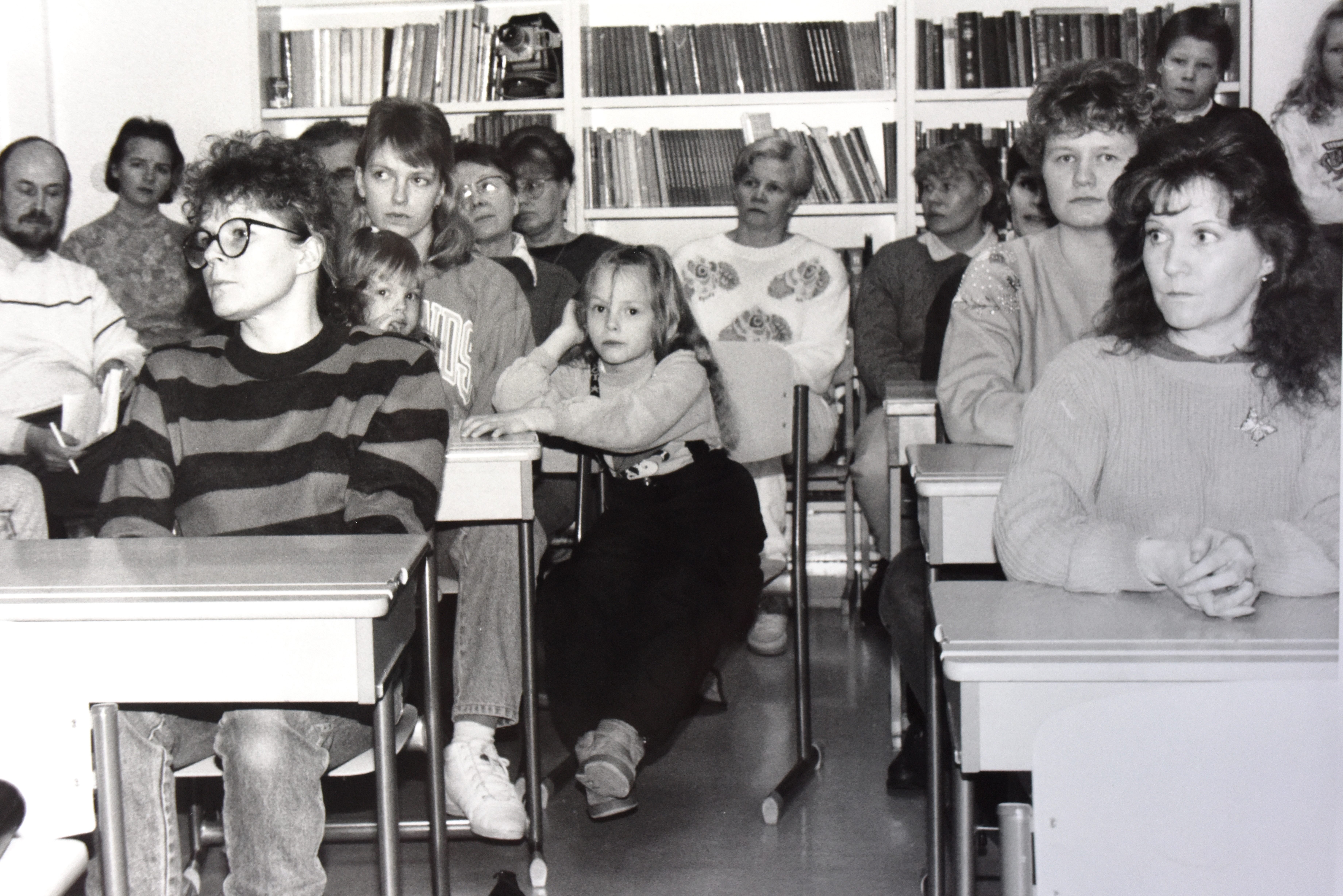 Missä kokouksessa kuvassa istutaan?
