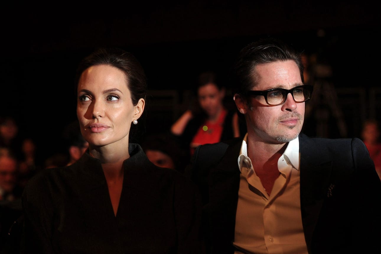 Angelina Jolie ja Brad Pitt kesäkuussa 2014. LEHTIKUVA/AFP