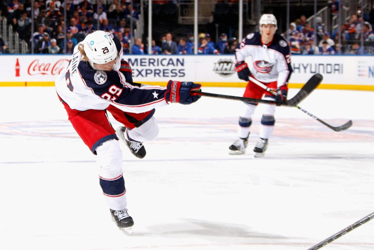 Laine (edessä) on kiinnostunut jatkamaan uraansa Columbuksessa ja myös Blue Jackets on kertonut haluavansa pitää Laineen riveissään. LEHTIKUVA/AFP