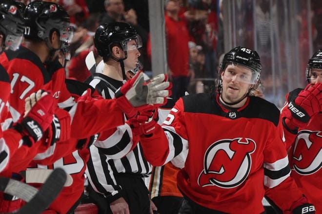 New Jersey Devilsin menestyksen sinetöi Sami Vatanen (keskellä). LEHTIKUVA / AFP