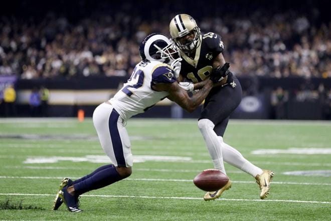 Los Angeles Ramsin Marcus Peters esti New Orleans Saintsin Ted Ginnia ottamasta kiinni palloa NFC:n konferenssifinaalissa. KUVA: LEHTIKUVA/STREETER LECKA