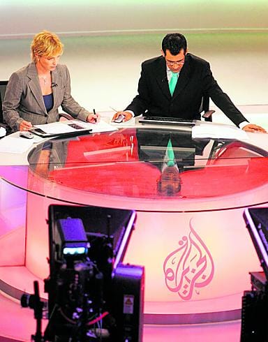 Toimittajat työskentelivät tiistaina al-jazeeran englanninkielisessä toimituksessa Dohassa Qatarissa.