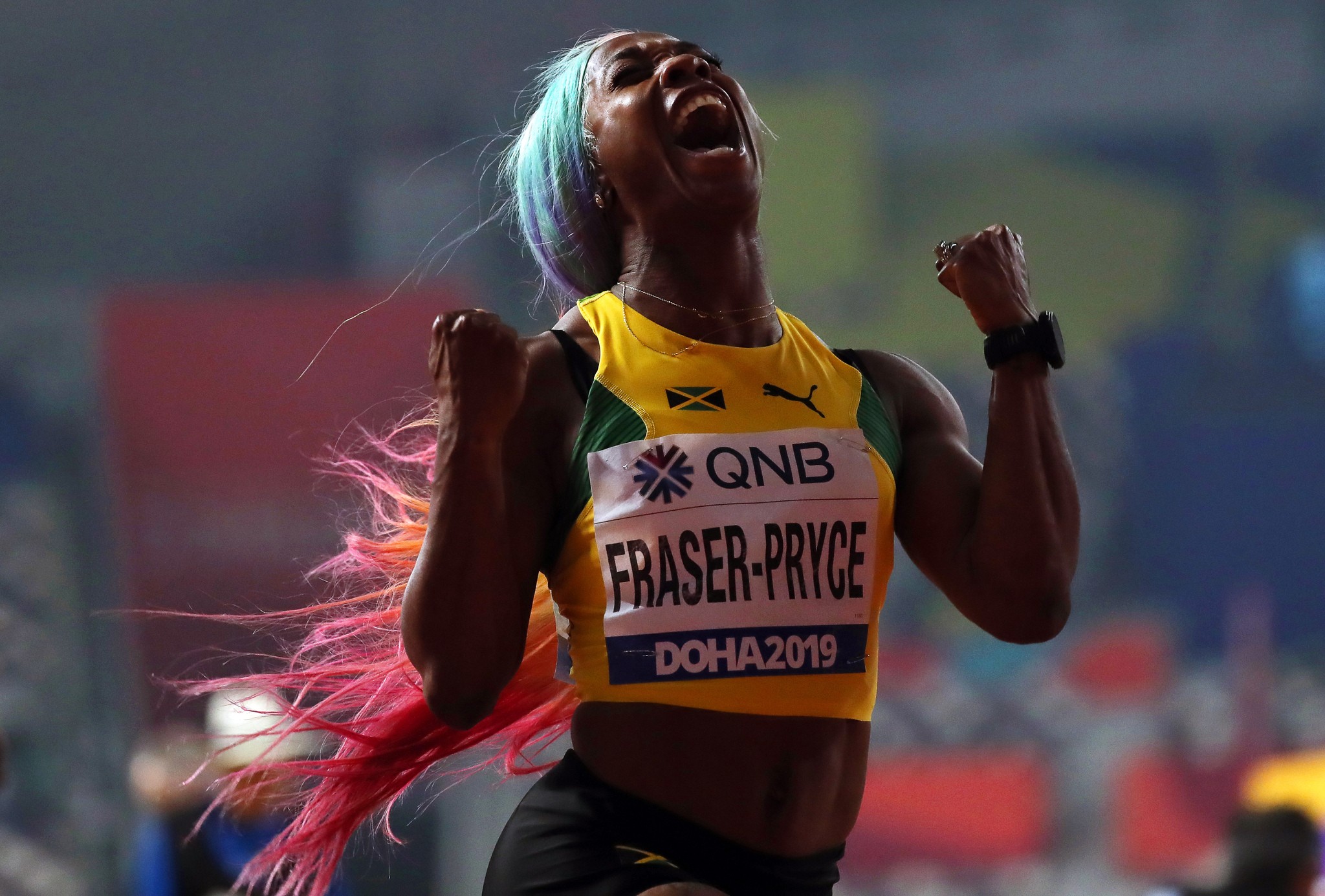 Shelly-Ann Fraser-Pryce (vas.) oli omaa luokkaansa naisten sadalla metrillä. BY: ALL OVER PRESS / EPA-PHOTO CODE: EPAXX8
