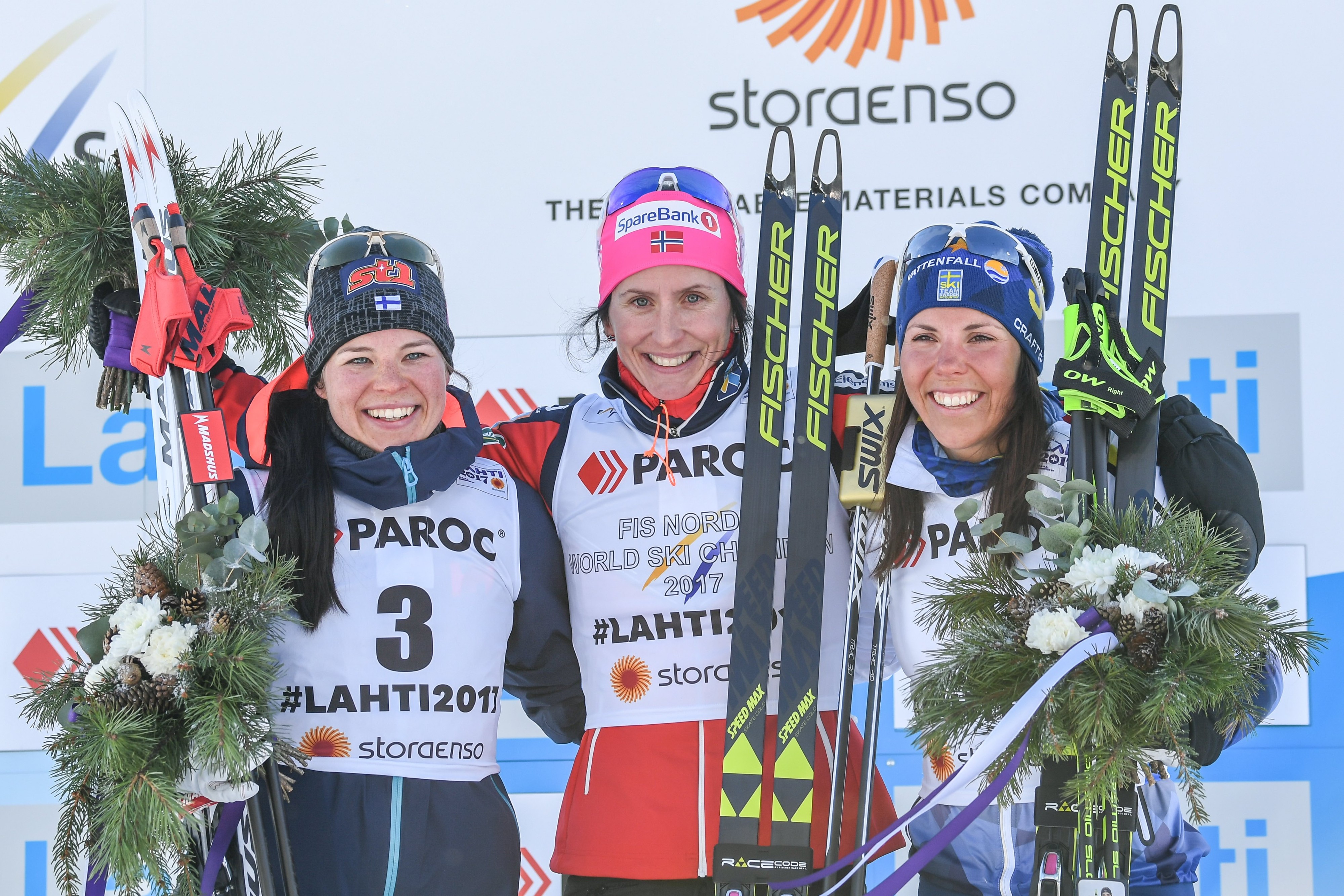 Mitalikolmikko: Krista Pärmäkoski, Marit Björgen ja Charlotte Kalla.