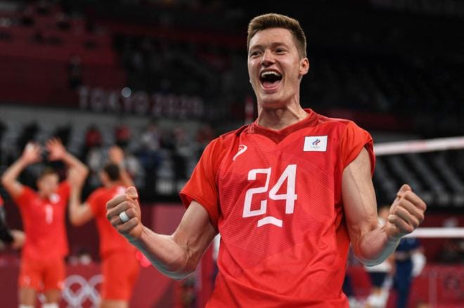 Igor Kobzar ja muut Venäjän olympiakomitean joukkueen pelaajat juhlivat voittoa Yhdysvalloista. Kuva: Lehtikuva / AFP