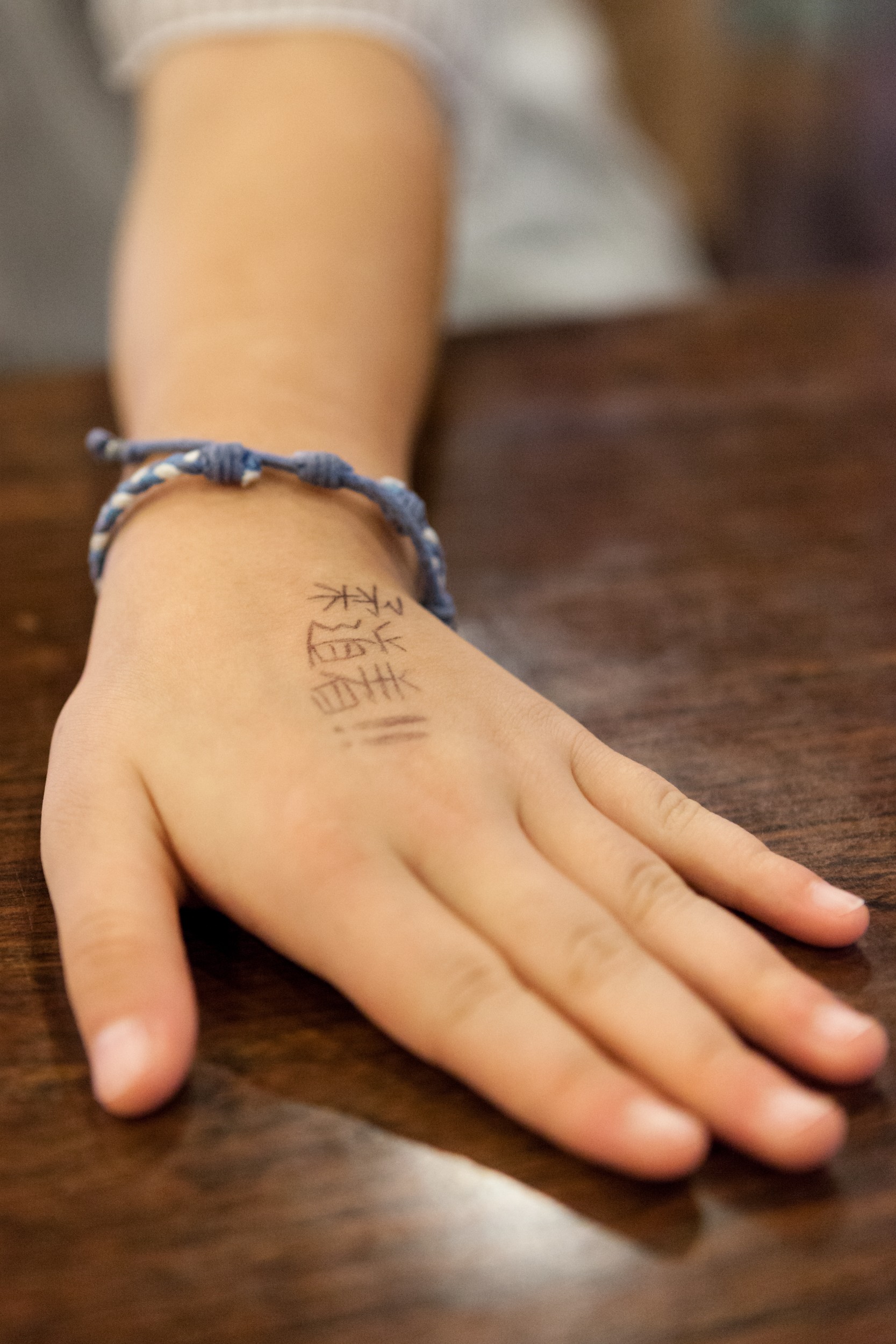 "Muista judopuku!" lukee Kanokon kämmenselässä.