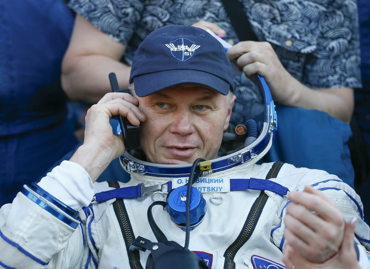 epa06006154 International Space Station (ISS) crew member Oleg Novitskiy of Russia speaks on the phone after landing via the Soyuz MS-03 capsule in a remote area outside the town of Dzhezkazgan (Zhezkazgan), Kazakhstan, 02 June 2017. Oleg Novitskiy and fellow crew member Thomas Pesquet spent over 196 days in space since launching to the International Space Station on 17 November 2016. EPA/SHAMIL ZHUMATOV / POOL BY: ALL OVER PRESS / EPA-PHOTO CODE: EPAXX8