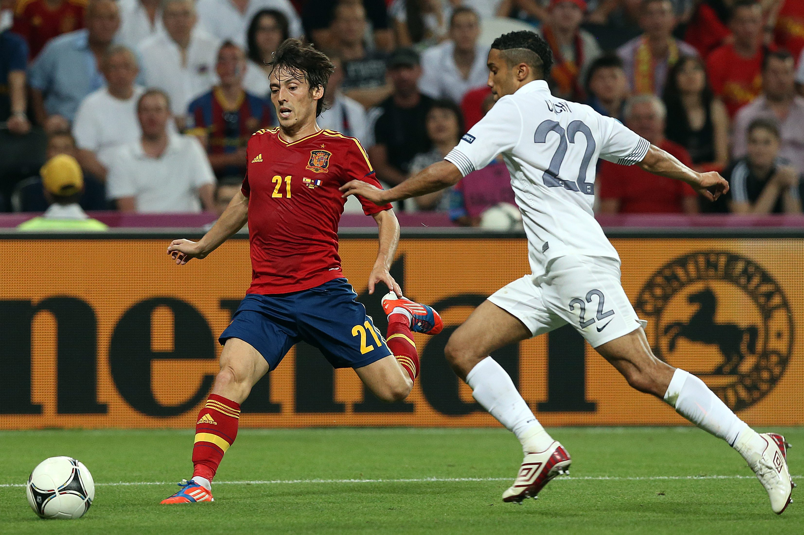 epa03278865 Gael Clichy of France (R) vies for the ball with Spain's David Silva during the quarter final match of the UEFA EURO 2012 between Spain and France in Donetsk, Ukraine, 23 June 2012.  EPA/SRDJAN SUKI UEFA Terms and Conditions apply http://www.epa.eu/downloads/UEFA-EURO2012-TCS.pdf
 BY: ALL OVER PRESS / EPA-PHOTO CODE: EPAXX8