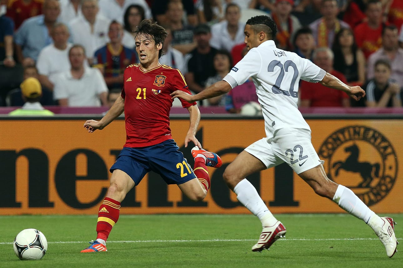 epa03278865 Gael Clichy of France (R) vies for the ball with Spain's David Silva during the quarter final match of the UEFA EURO 2012 between Spain and France in Donetsk, Ukraine, 23 June 2012. EPA/SRDJAN SUKI UEFA Terms and Conditions apply http://www.epa.eu/downloads/UEFA-EURO2012-TCS.pdf BY: ALL OVER PRESS / EPA-PHOTO CODE: EPAXX8