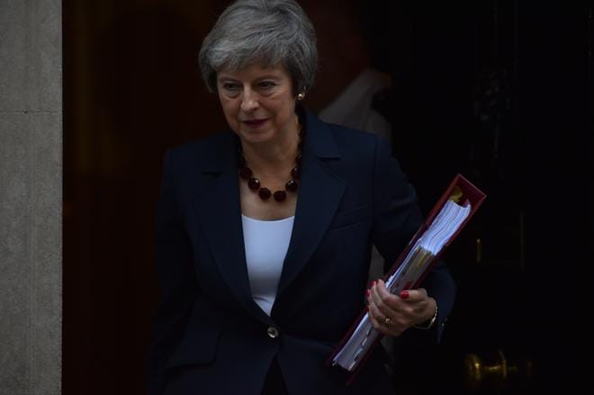 Theresa May oli tyytyväinen sopimusluonnokseen keskiviikkoiltana. KUVA: Alberto Pezzali