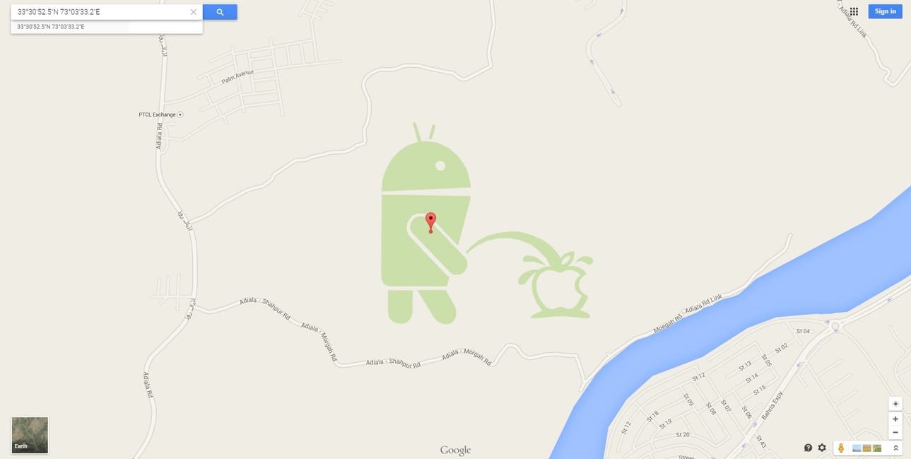 Androidin robottimaskotti virtsaa Googlen kartalla Applen päälle.