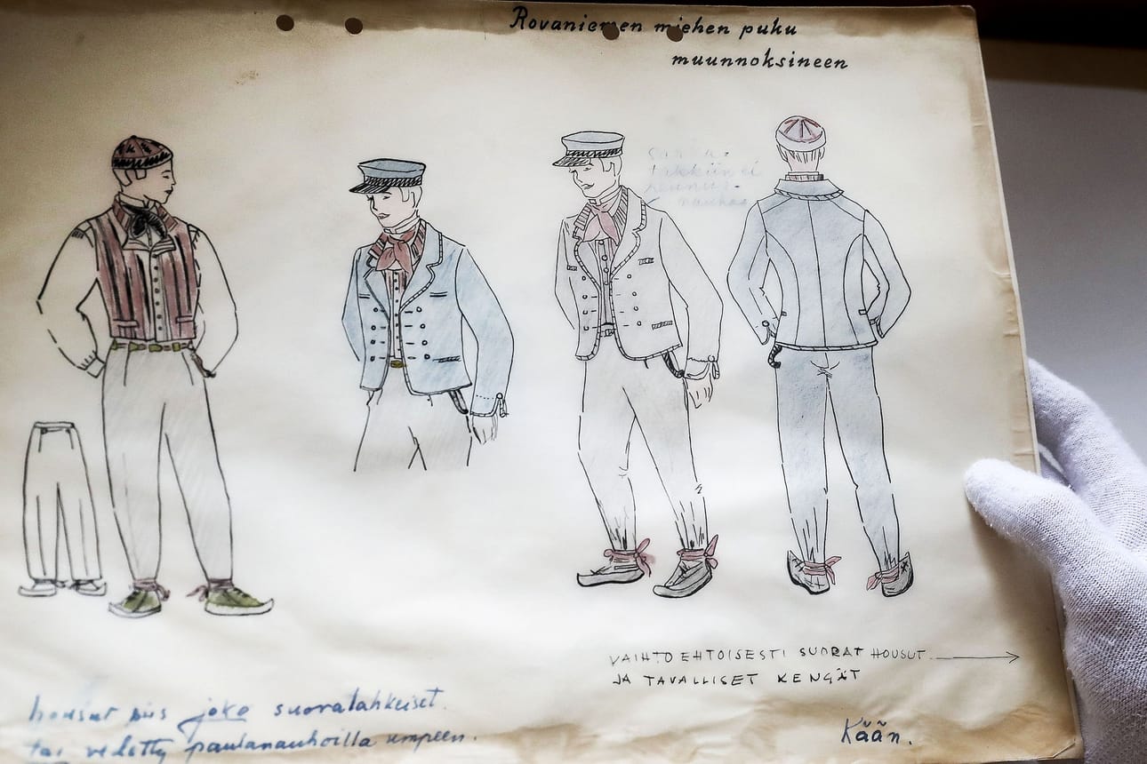 Miehen puvun piirroksia Lapin maakuntamuseossa olevasta alkuperäisestä suunnittelukansiosta.