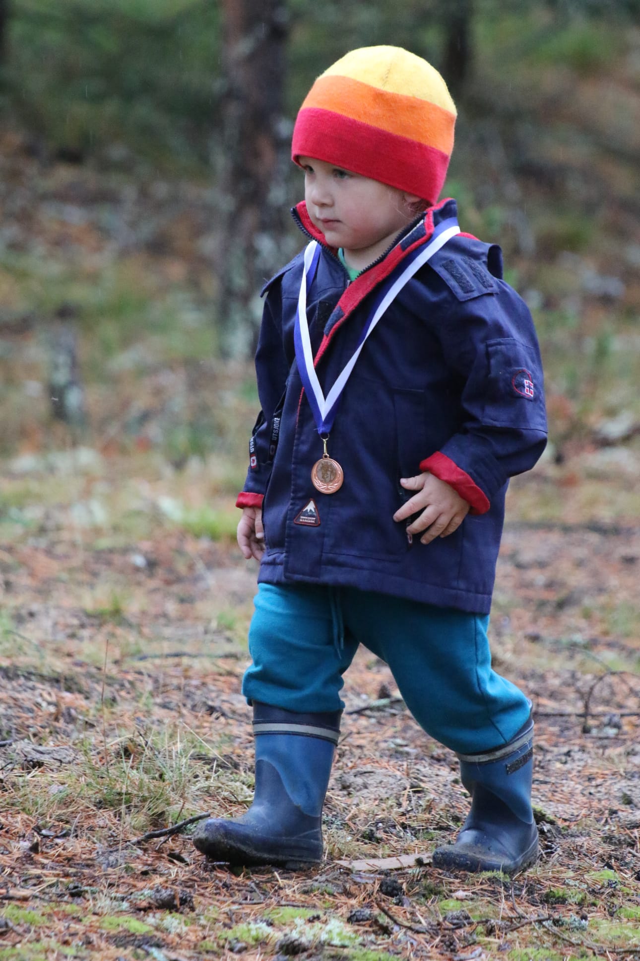 Uula Marjaniemi mitali kaulassa.