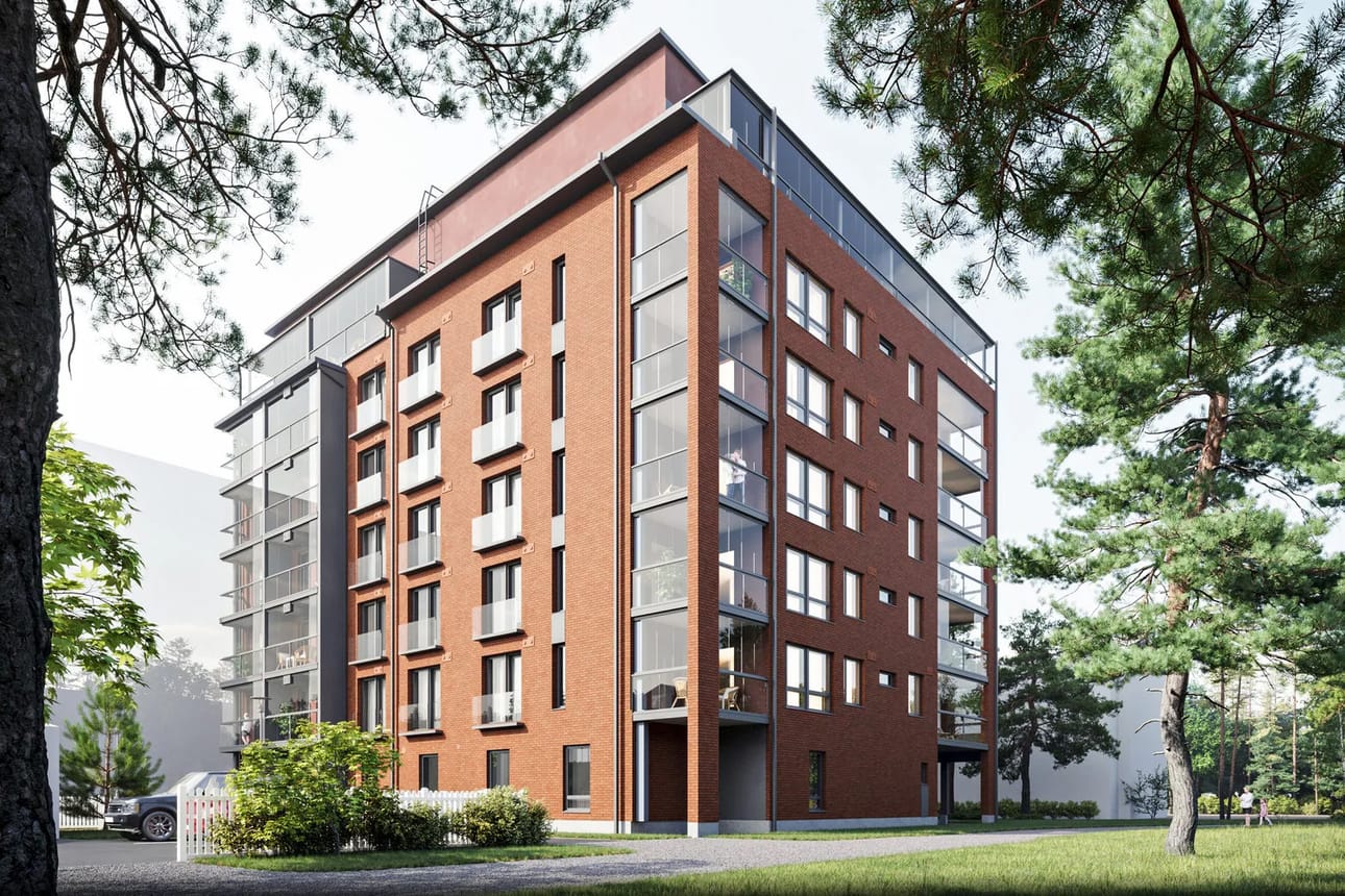 Punatiilinen talo istuu ympäristöönsä suhteellisen näppärästi.